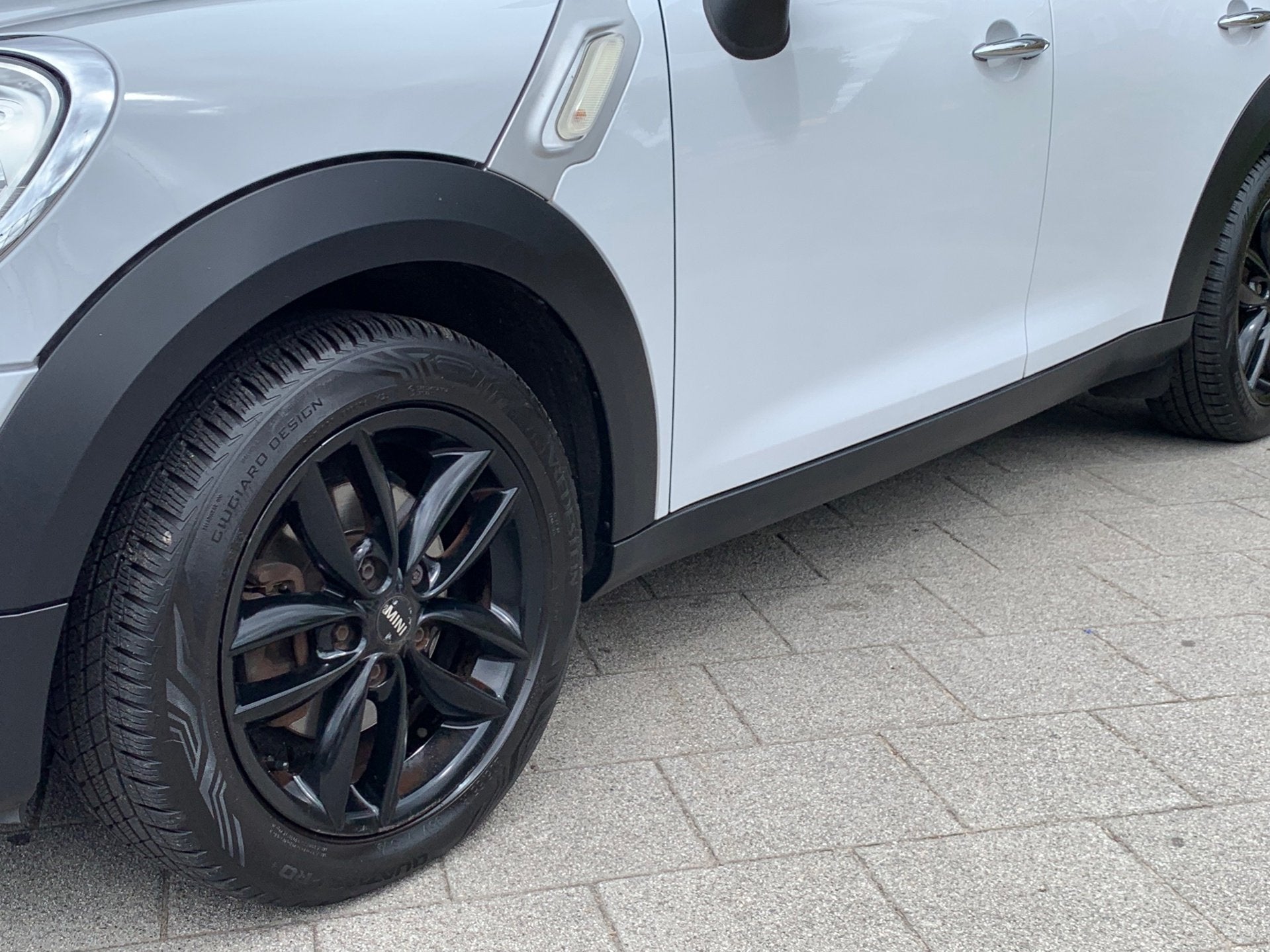 Mini Countryman 1.6 One Edition|Opendak|Navigatie|Airco|, Voorwielaandrijving, Gebruikt, Zwart, Leder en Stof