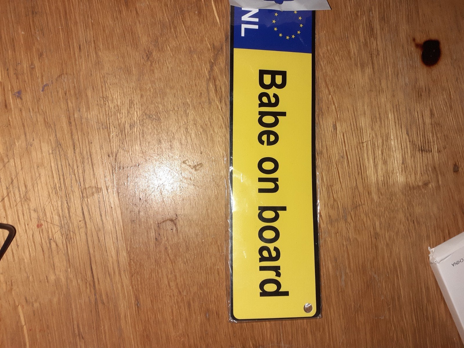 bordje voor in auto, Ophalen