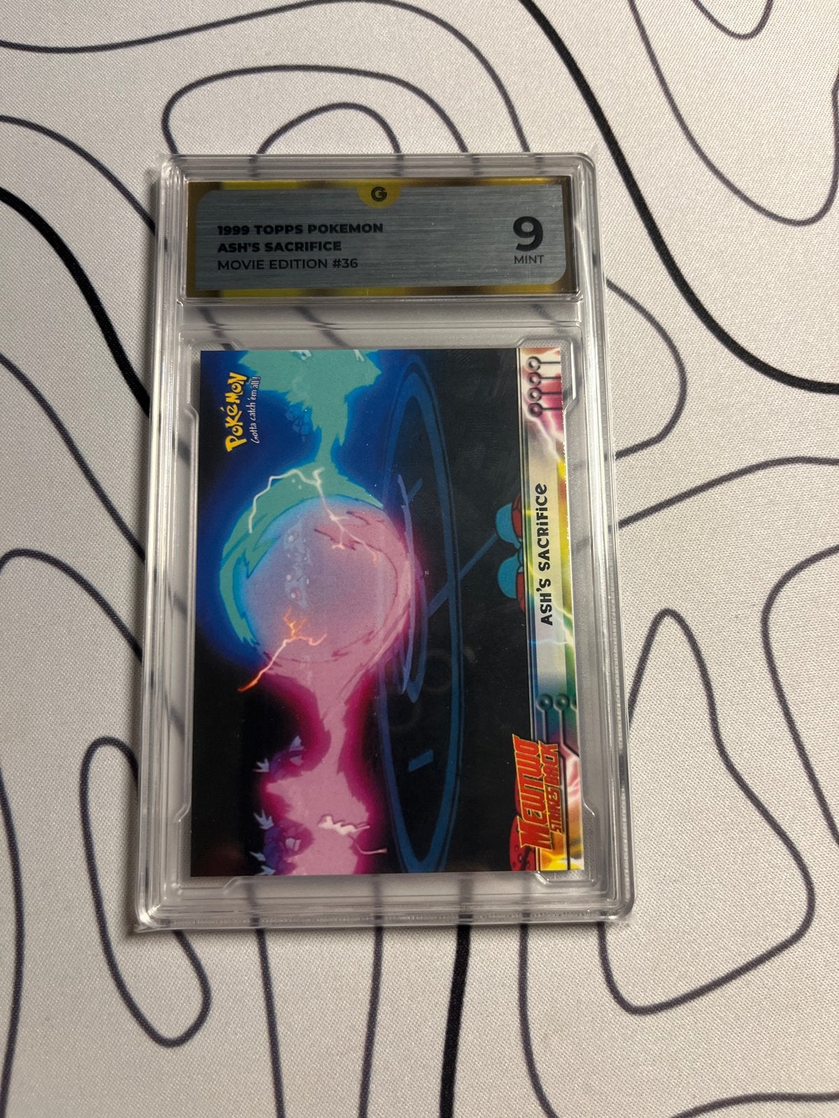 1999 Topps Pokémon Ash's Sacrifice Movie Edition #36 PSA 9, Ophalen of Verzenden, Zo goed als nieuw, Losse kaart