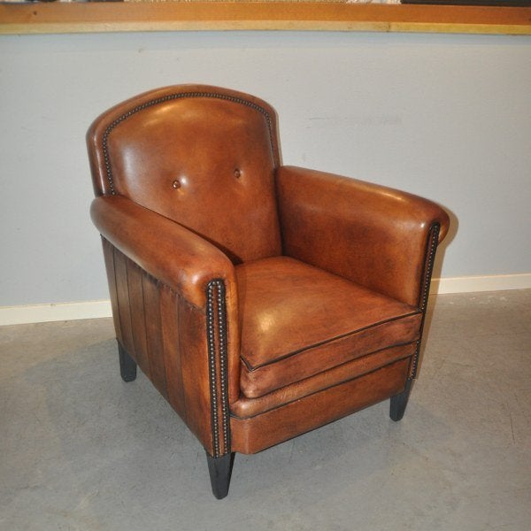 Leeds, een schapenleren fauteuil van Lounge Atelier, Gebruikt, Ophalen of Verzenden, 50 tot 75 cm, Leer