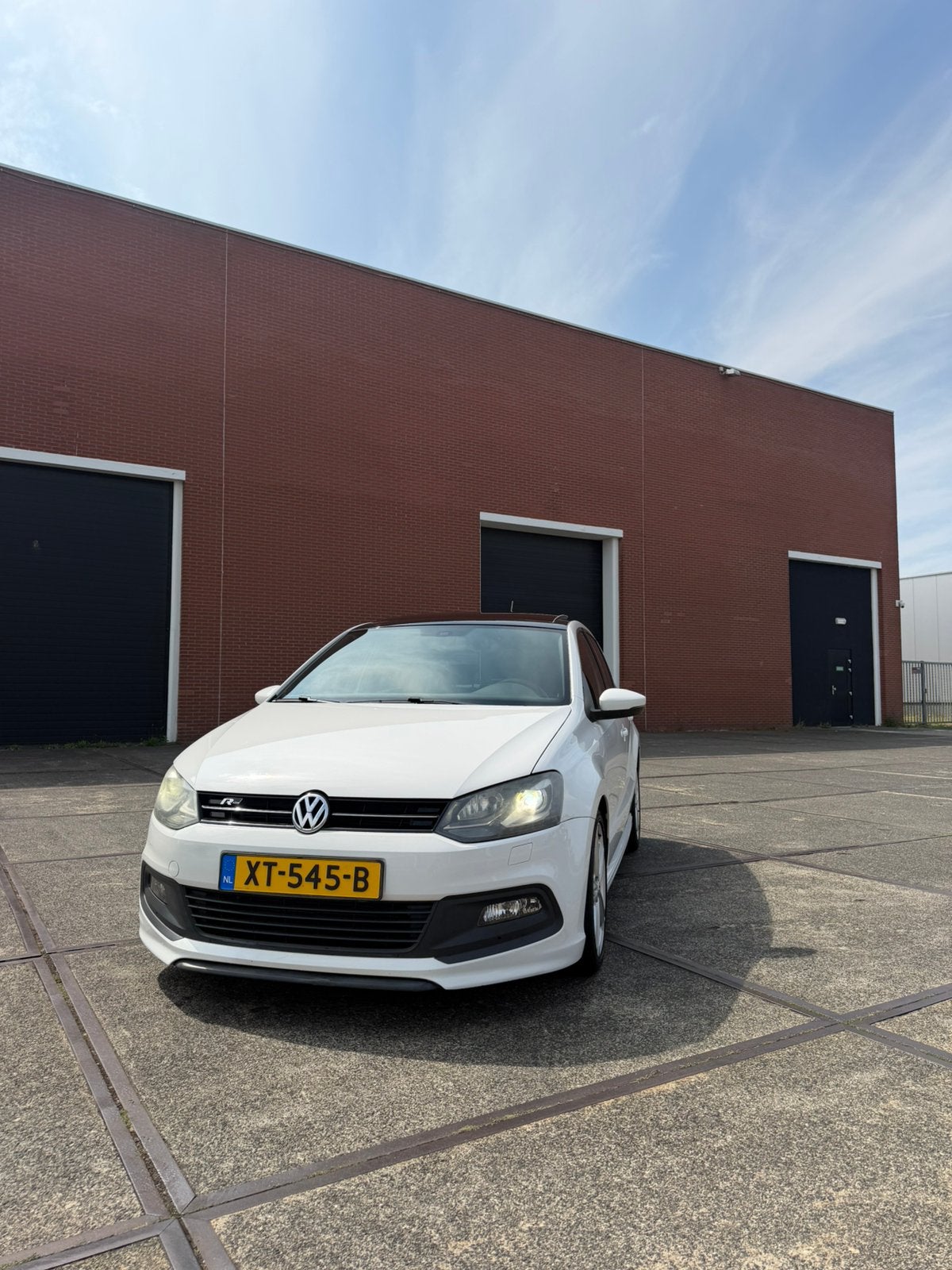 Volkswagen Polo 1.2 TSI R-line 77KW DSG 2013 Wit, 40 €/maand, 4 cilinders, Wit, 1200 kg