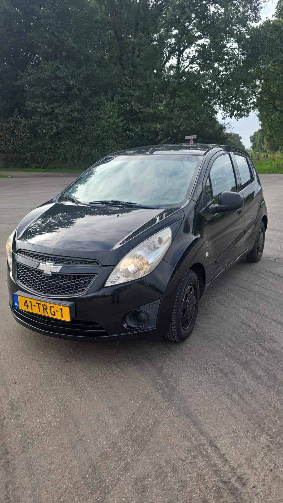 Chevrolet Spark 1.0 Bifuel 2012 Zwart APK 22-09-2027, Auto's, Euro 5, 37 €/maand, 4 cilinders, Zwart