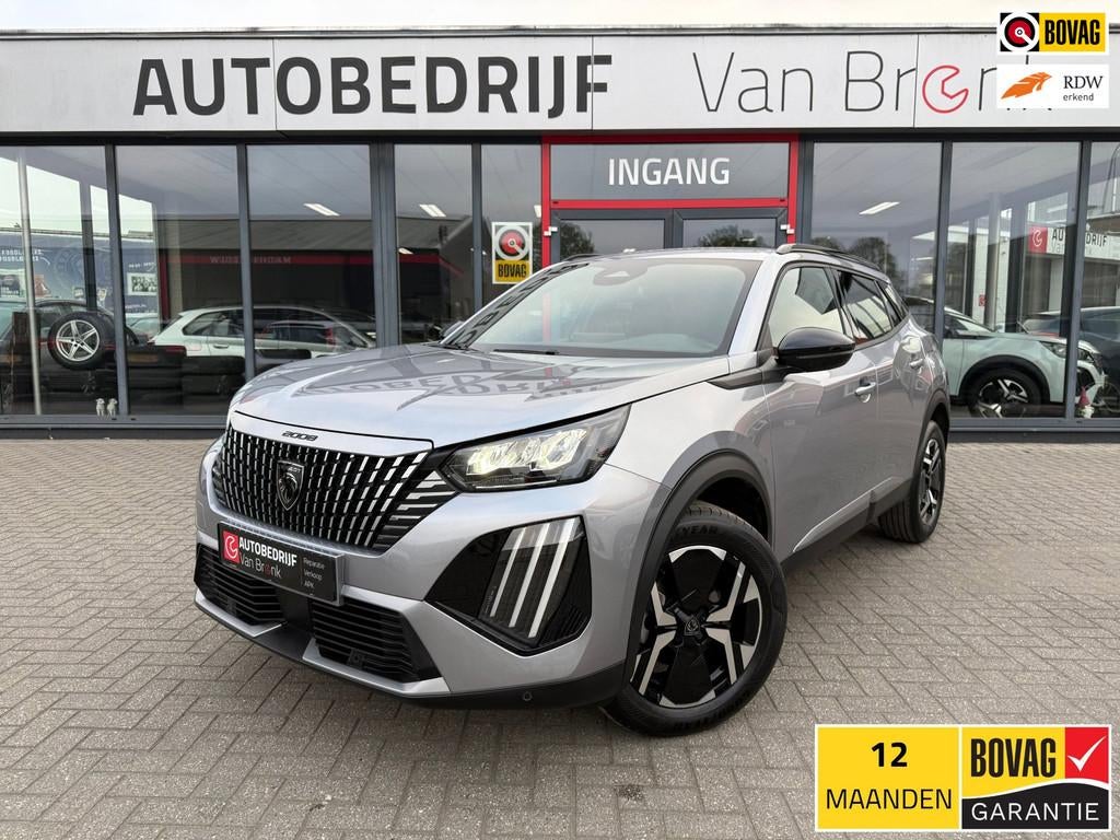 Peugeot 2008 1.2 PureTech 100PK Allure | Carplay | Cruise |, Gebruikt, 1199 cc, Parkeersensor, Leder en Stof