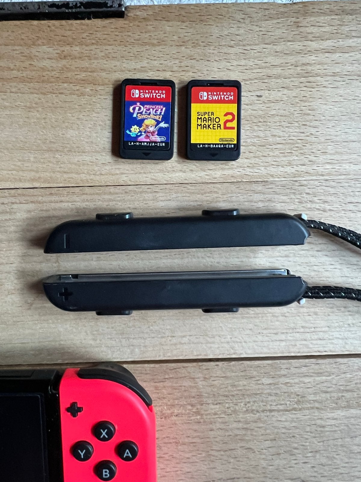 Foto 3 van Nintendo Switch Oled met accessoires en games