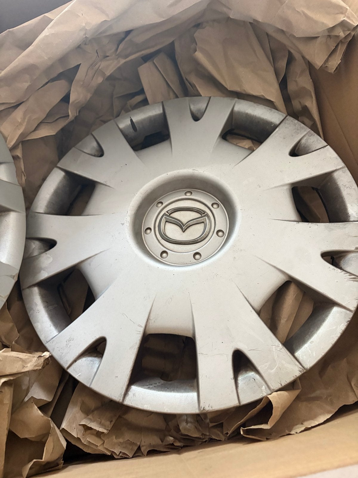 Mazda wieldoppen 15 inch, Ophalen, Gebruikt