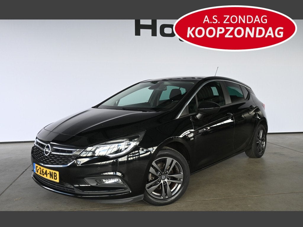 Opel Astra 1.0 Turbo 120 Jaar Edition Airco Navigatie Carpla, Auto's, Opel, Stof, Gebruikt, Met garantie (alle), 610 kg