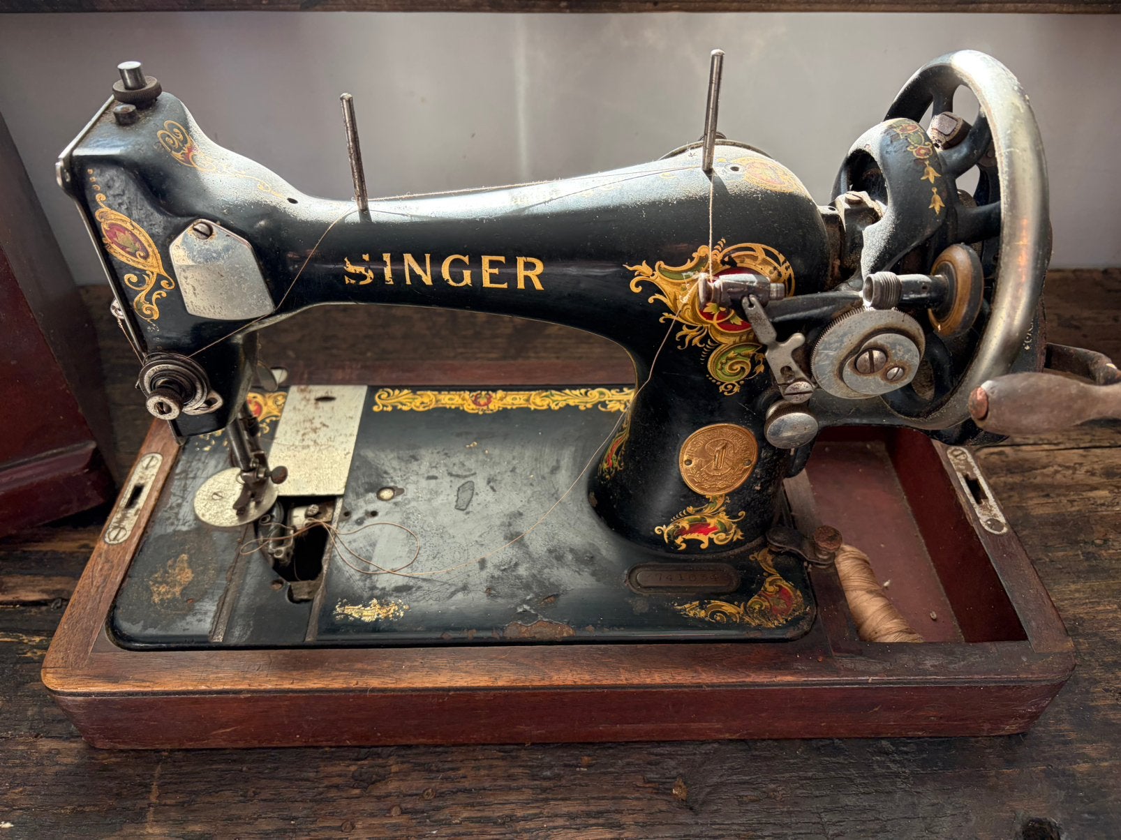 Oude singer naaimachine, Ophalen