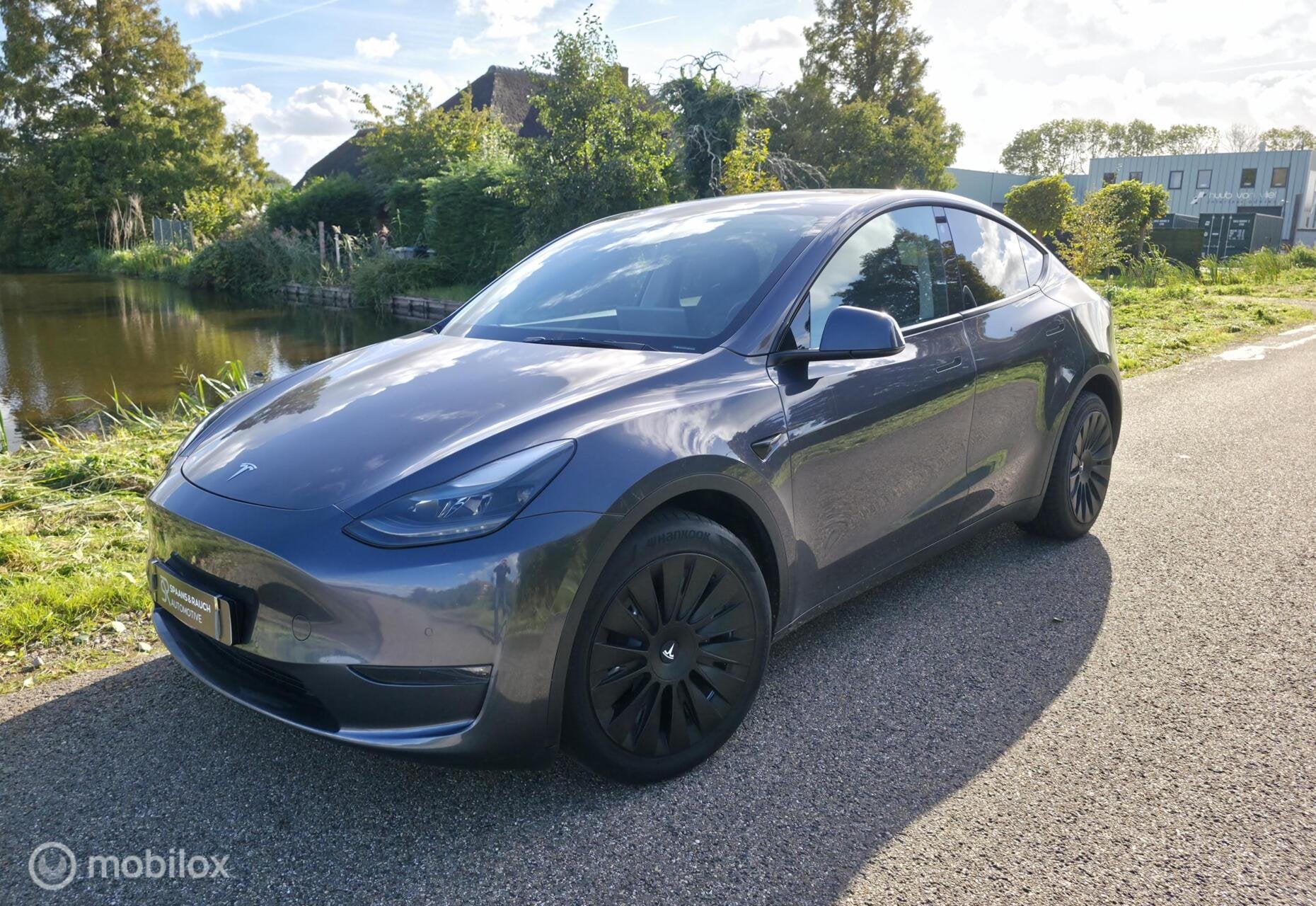 Tesla Model Y Long Range AWD 75 kWh / Trekhaak / Leder, Automaat, Gebruikt, Zwart, Verwarmde buitenspiegels