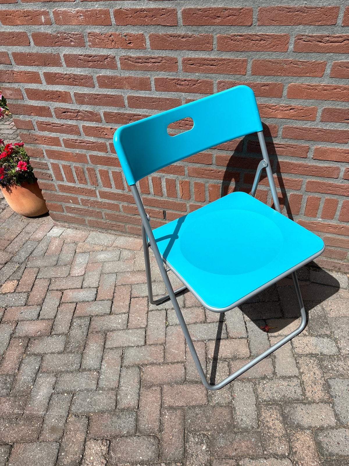 IKEA Nick Klapstoel - Turquoise, Huis en Inrichting, Kunststof, Gebruikt, Overige kleuren, Ophalen of Verzenden