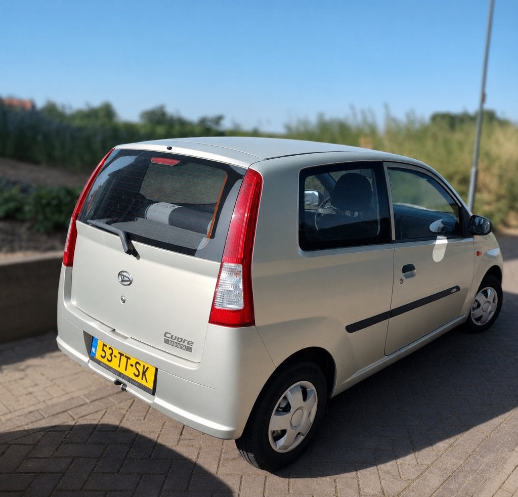 Daihatsu Cuore 1.0 Osaka 3D 2007 Beige, Auto's, Daihatsu, Voorwielaandrijving, Stof, 600 kg, Zwart