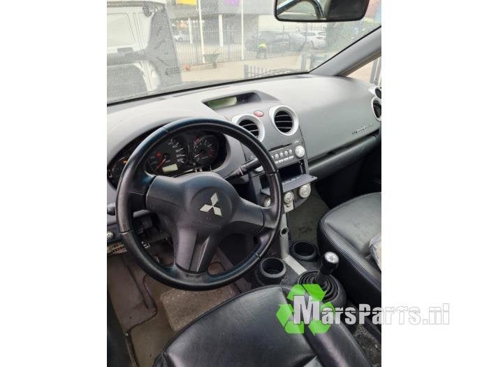 Kilometerteller KM van een Mitsubishi Colt