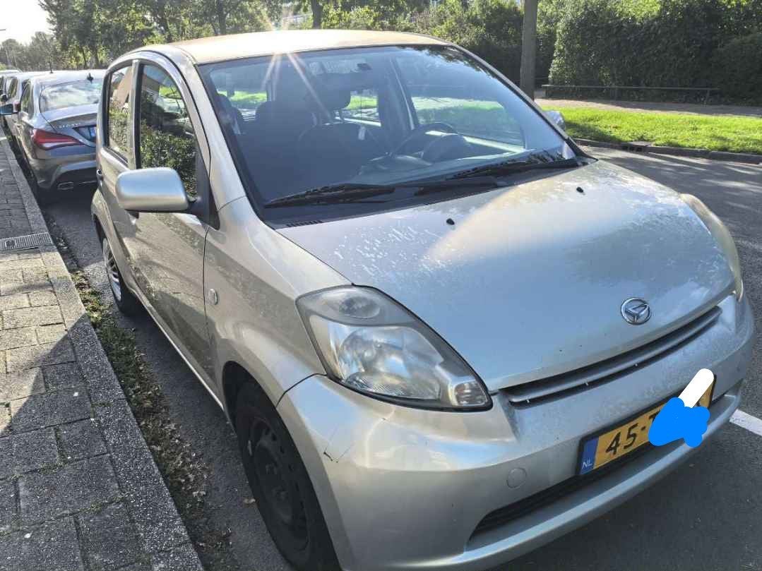 Daihatsu Sirion 1.0 51KW 2007 Beige, Auto's, Voorwielaandrijving, Beige, Handgeschakeld, 3 cilinders