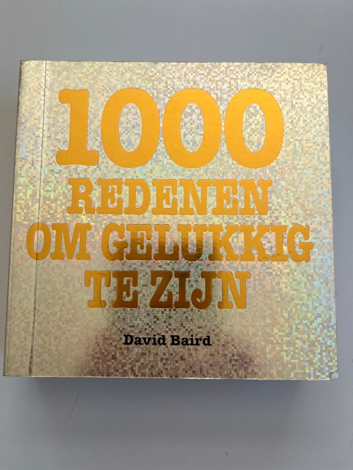 1000 Redenen om Gelukkig te Zijn - David Baird, Boeken, Ophalen of Verzenden, Gelezen, Overige uitgevers, Nederlands