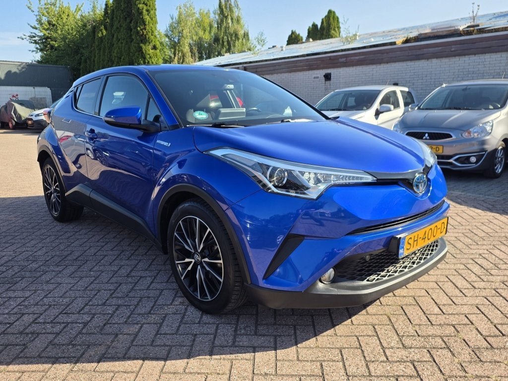 Toyota C-HR 1.8 Hybrid Dynamic (bj 2018, automaat), Auto's, Stof, 4 cilinders, Blauw, 26 km/l