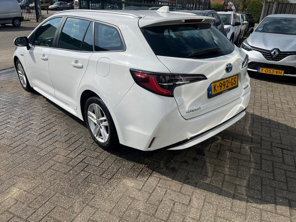 Toyota Corolla Touring Sports 1.8 Hybrid Business, Auto's, Toyota, 1345 kg, 450 kg, Gebruikt, 4 cilinders