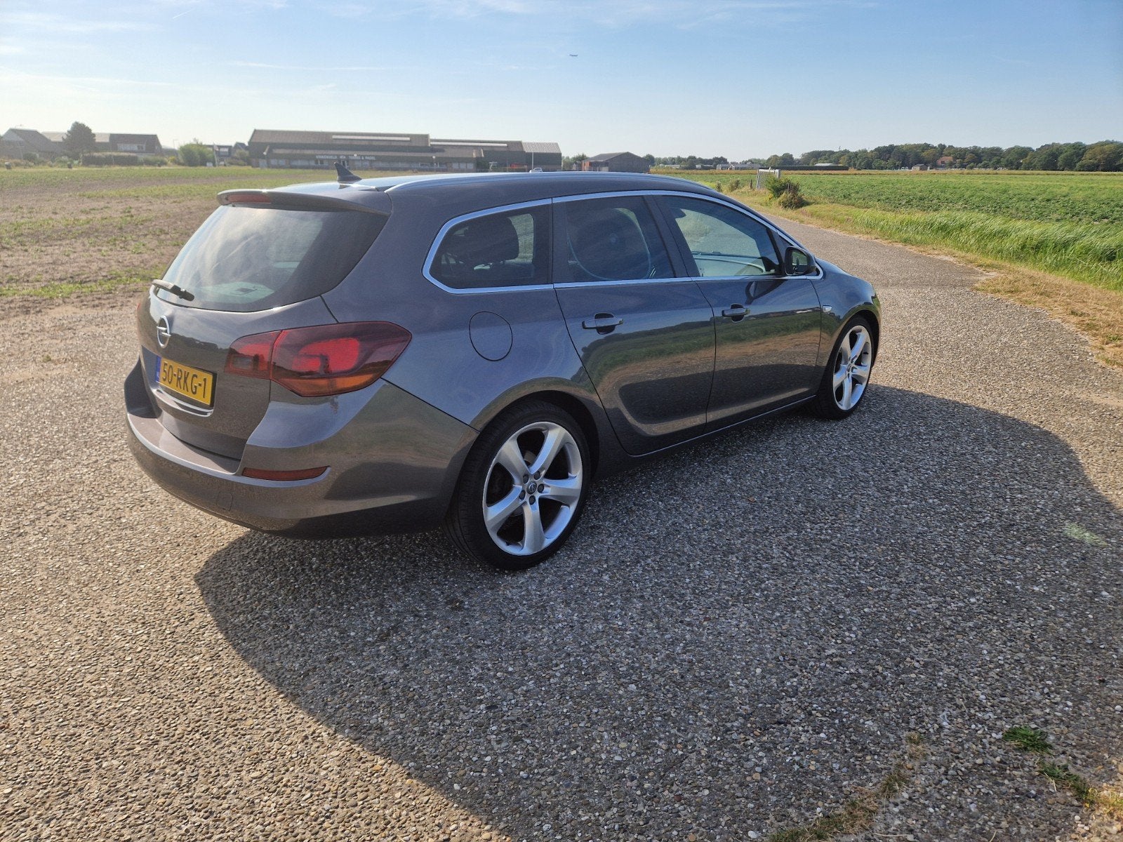 Opel astra j sports tourer 1.4 turbo, Ophalen, Stationwagon, 1400 cc, Zilver of Grijs