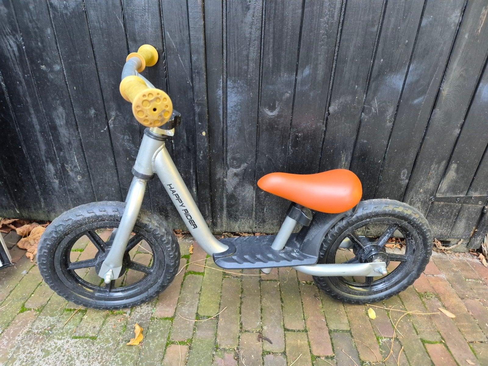 Loopfiets Grijs met Oranje Zadel, Ophalen, Gebruikt, Loopfiets