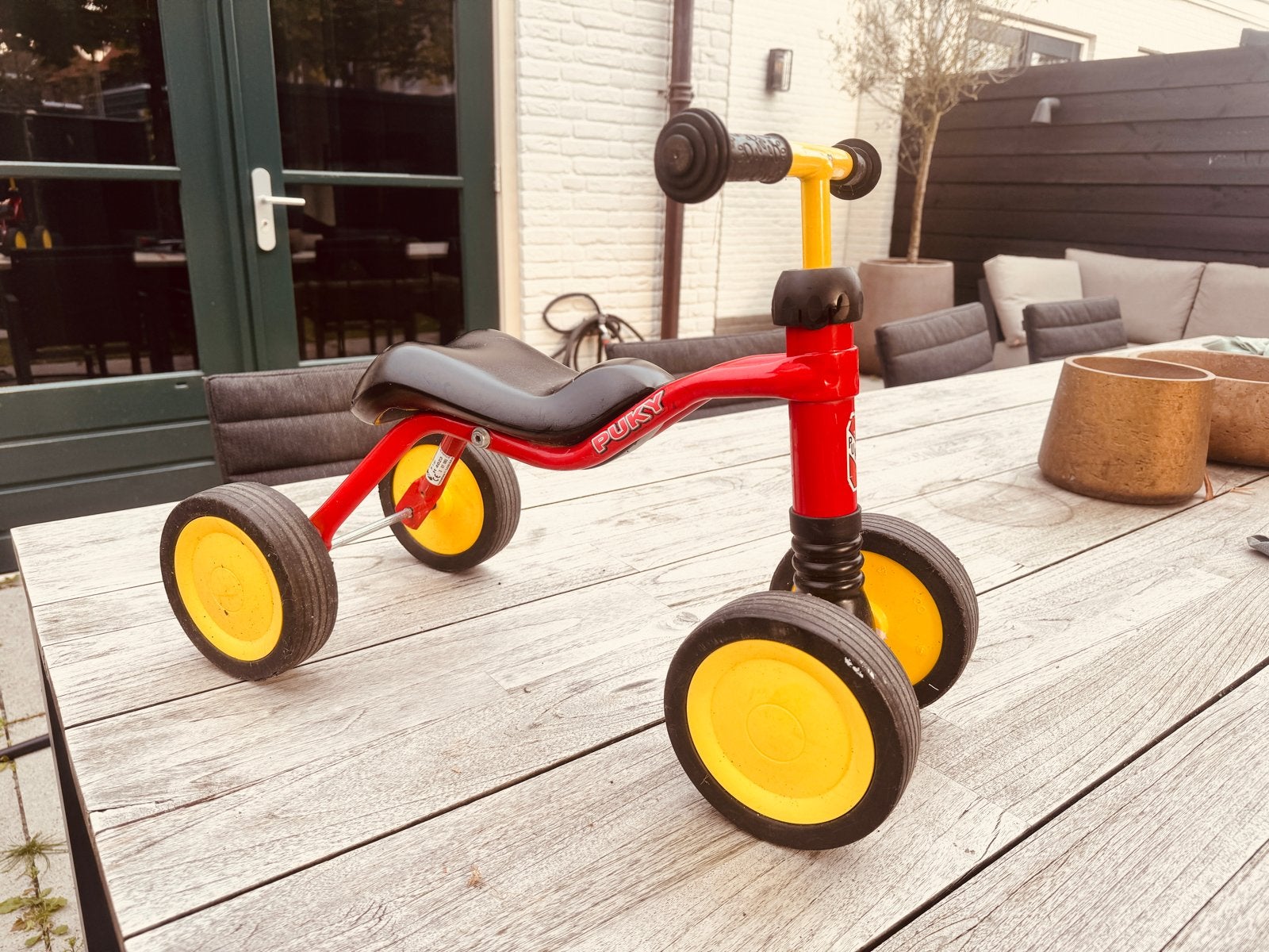 Puky loopfietsje rood met geel