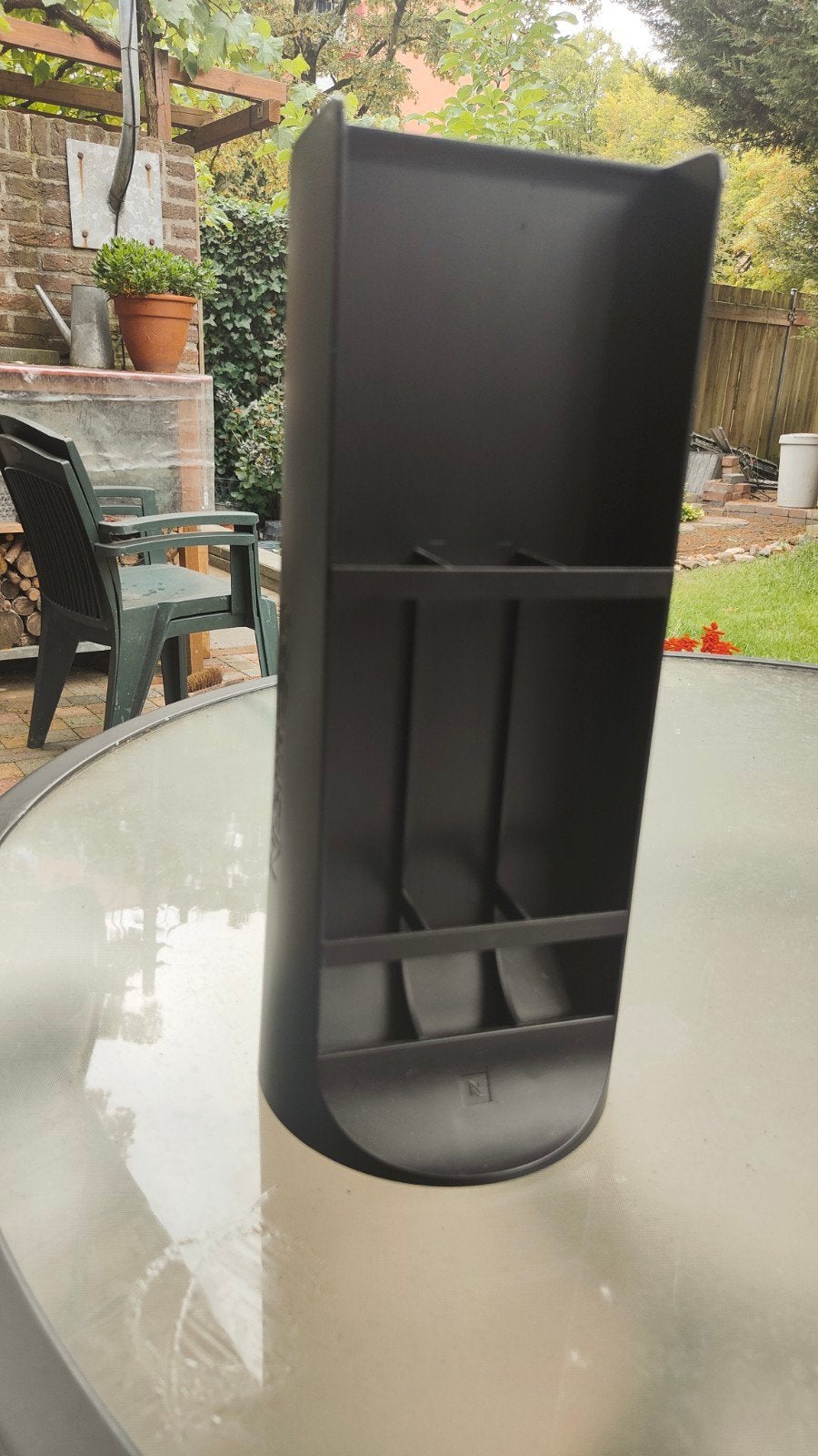 Nespresso capsulehouder, Ophalen