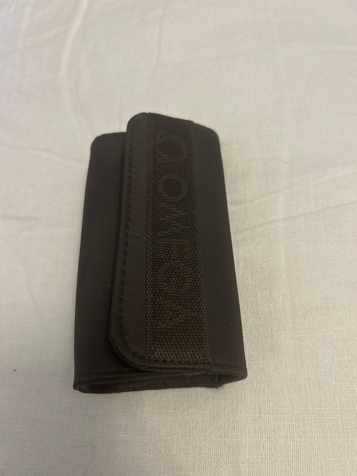 Donkerbruine sleuteletui met Omega, Gebruikt, Bruin, Guess, Ophalen of Verzenden