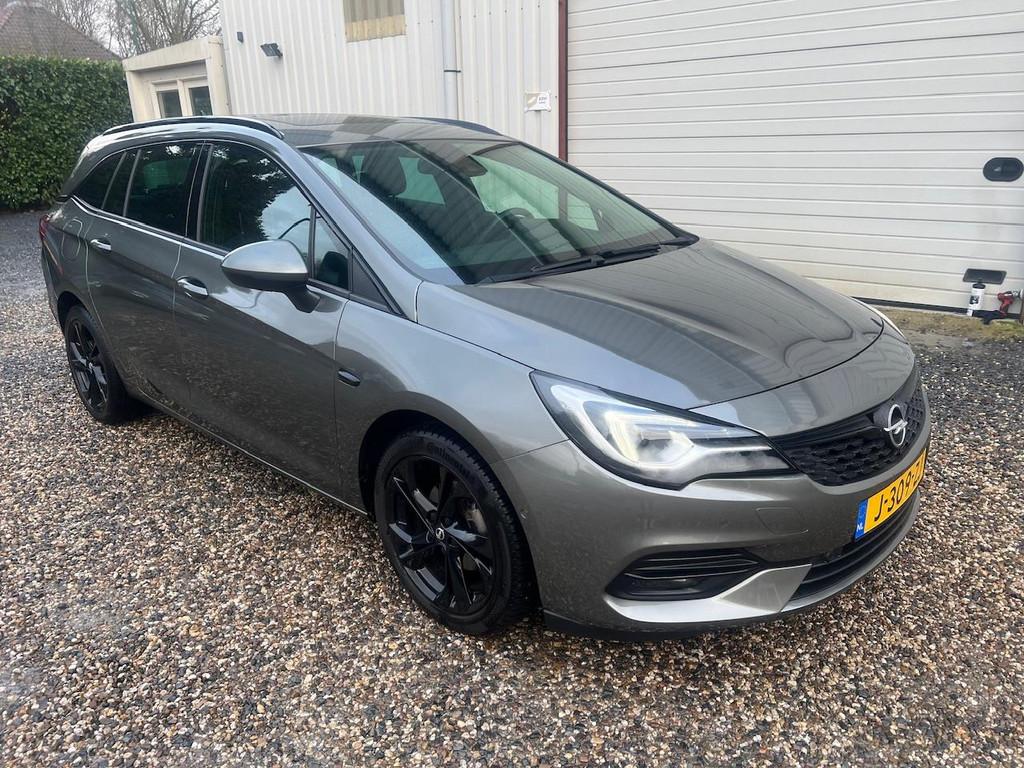 Opel Astra Sports Tourer 1.4 Ultimate AUT.DAKJE.NAVI.CAM.LEE, Auto's, Gebruikt, 146 pk, Origineel Nederlands, 3 cilinders