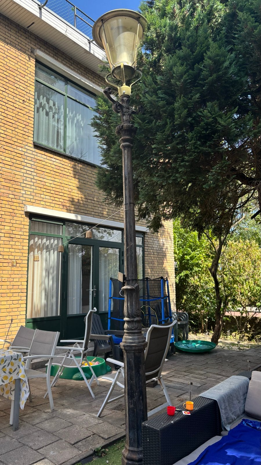 Antieke gietijzeren lantaarnpaal, Ophalen