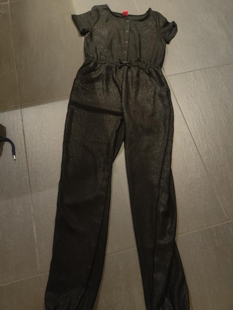 Zwarte glitter jumpsuit maat 146/152, Ophalen, Zo goed als nieuw, Maat 34 (XS) of kleiner, Zwart