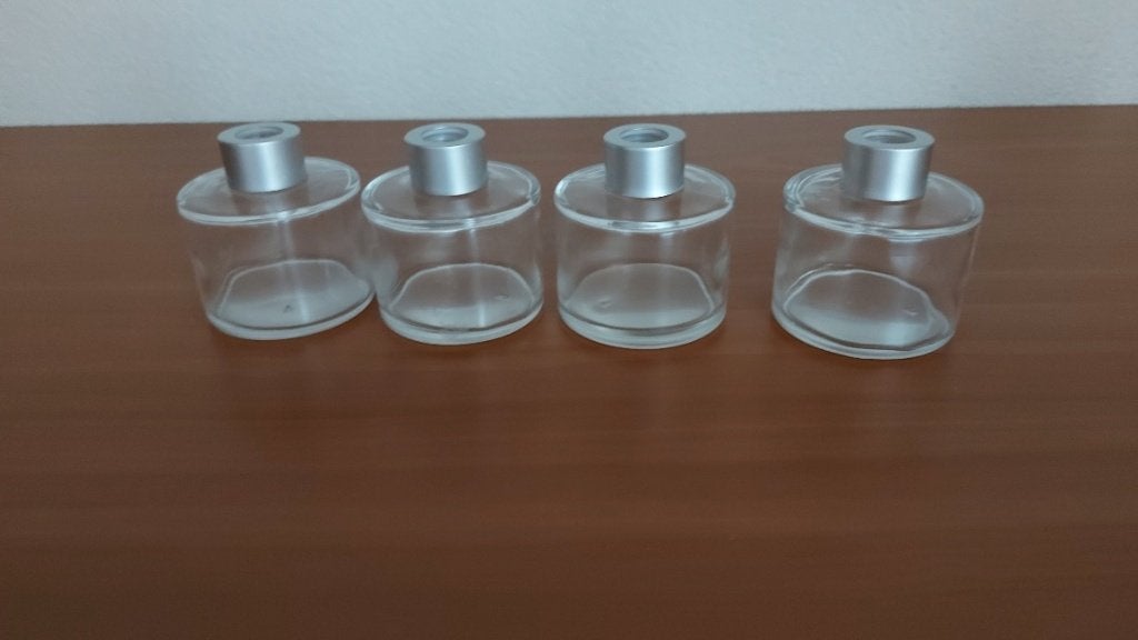 Set van 4 identieke glazen geurflesjes, Ophalen of Verzenden