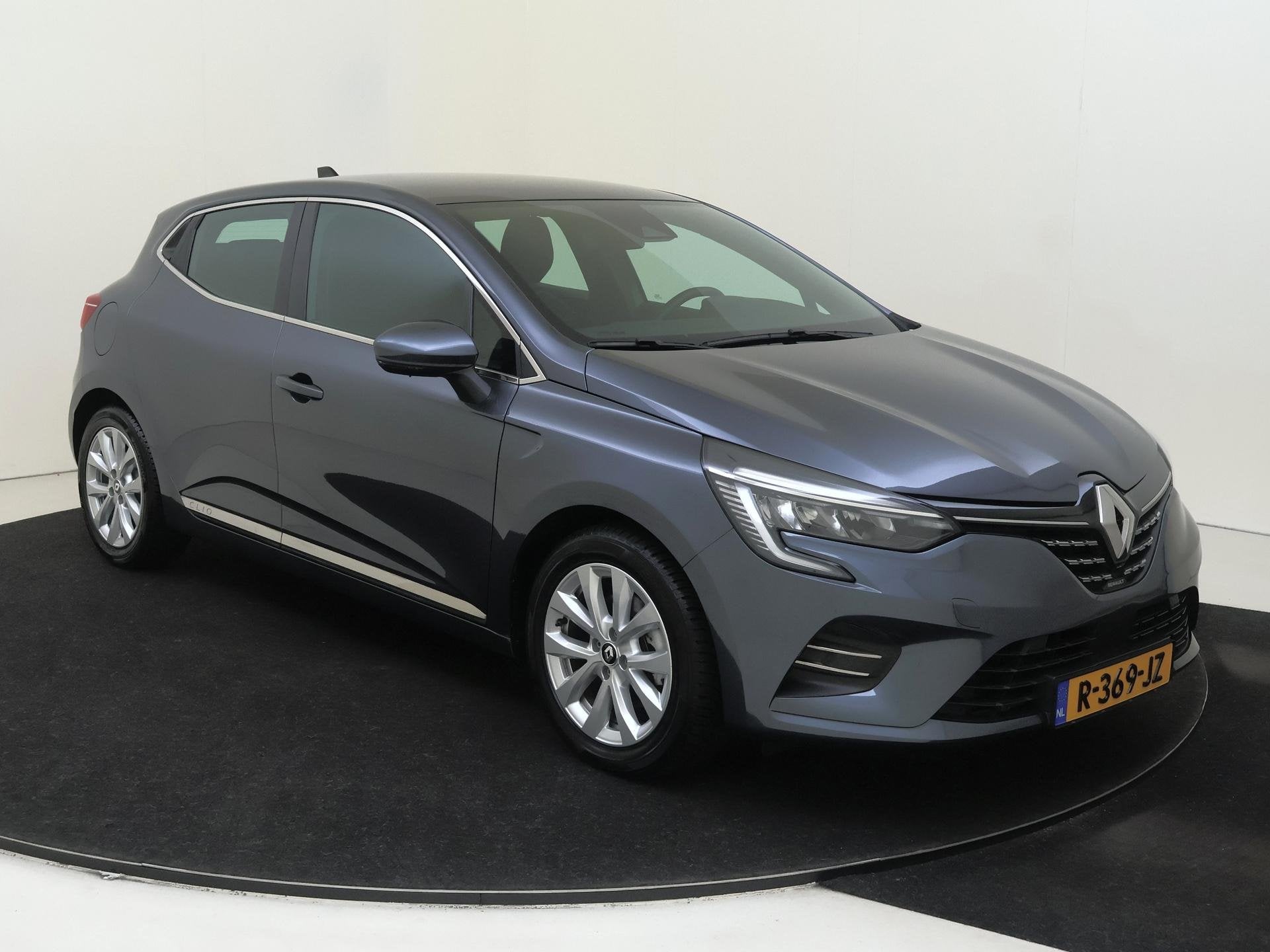Renault Clio 1.6 E-Tech Hybrid Intens 145PK | Automaat | Tre, Auto's, Gebruikt, Euro 6, Leder en Stof, Origineel Nederlands