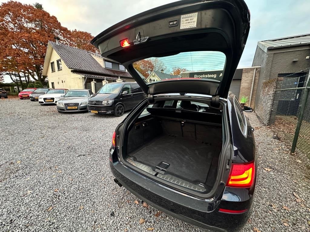 Foto 13 van BMW 5-serie Touring 520i High Executive netteauto/keurigonde