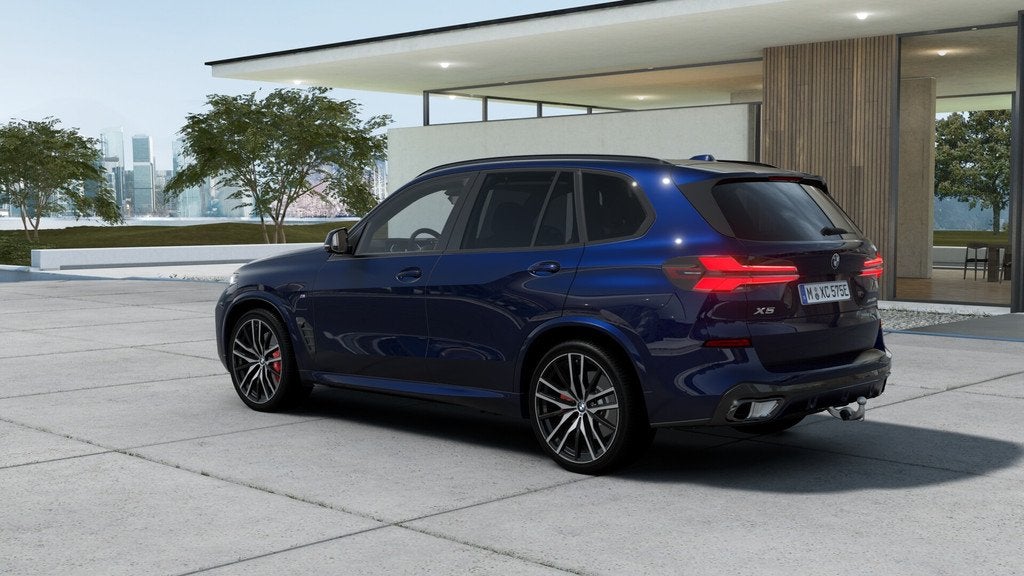 BMW X5 xDrive50e M Sport Automaat / Panoramadak Sky Lounge /, Auto's, BMW, Automaat, Stoelverwarming, 2395 kg, Blauw