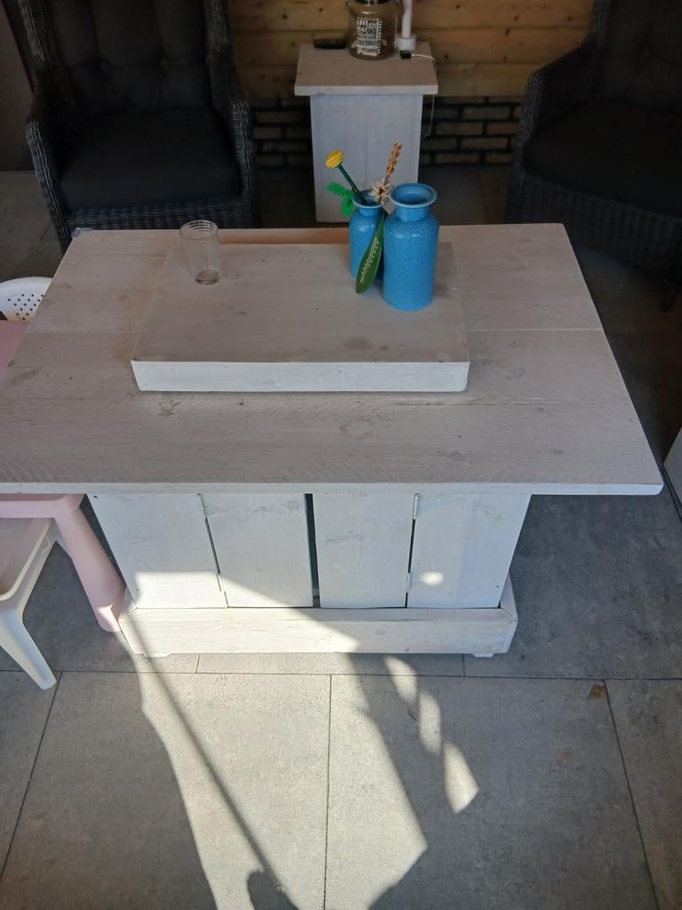 Te koop vuurtafel, Ophalen