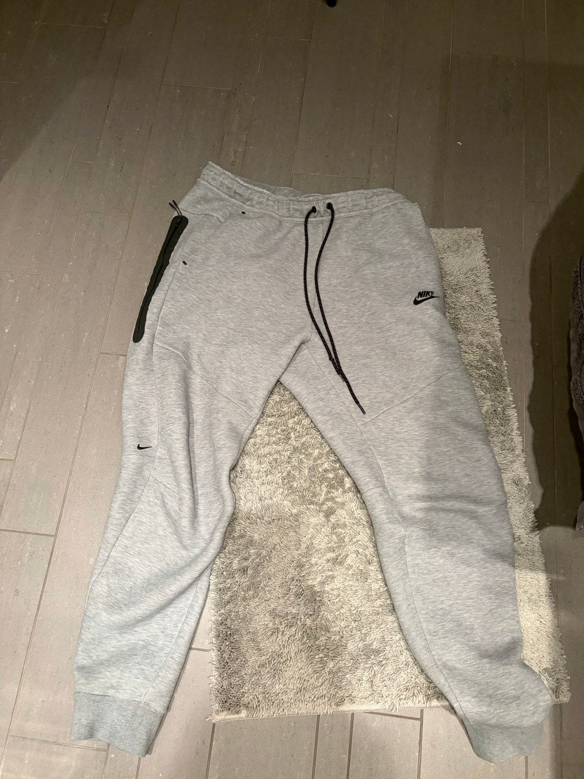 Nike Tech Fleece Joggingbroek Maat L Grijs, Ophalen of Verzenden, Gedragen, Maat 52/54 (L), Grijs