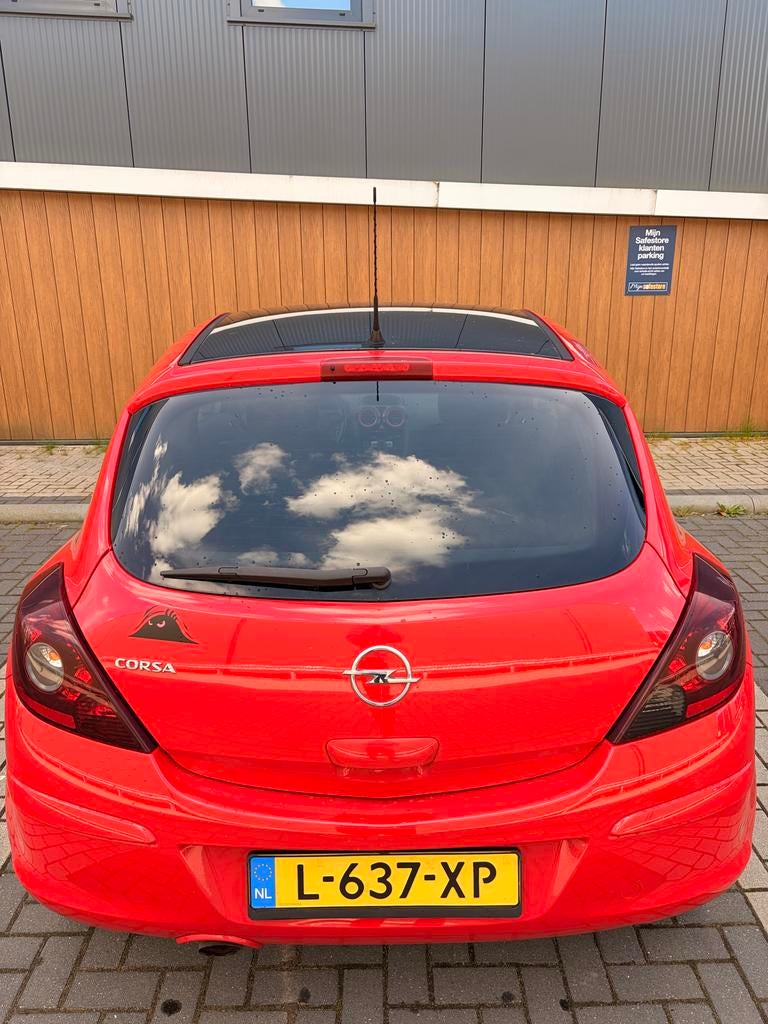 Opel Corsa 1.4 16V 3D 2010 Rood, Auto's, Opel, Voorwielaandrijving, 40 €/maand, 1398 cc, 4 cilinders