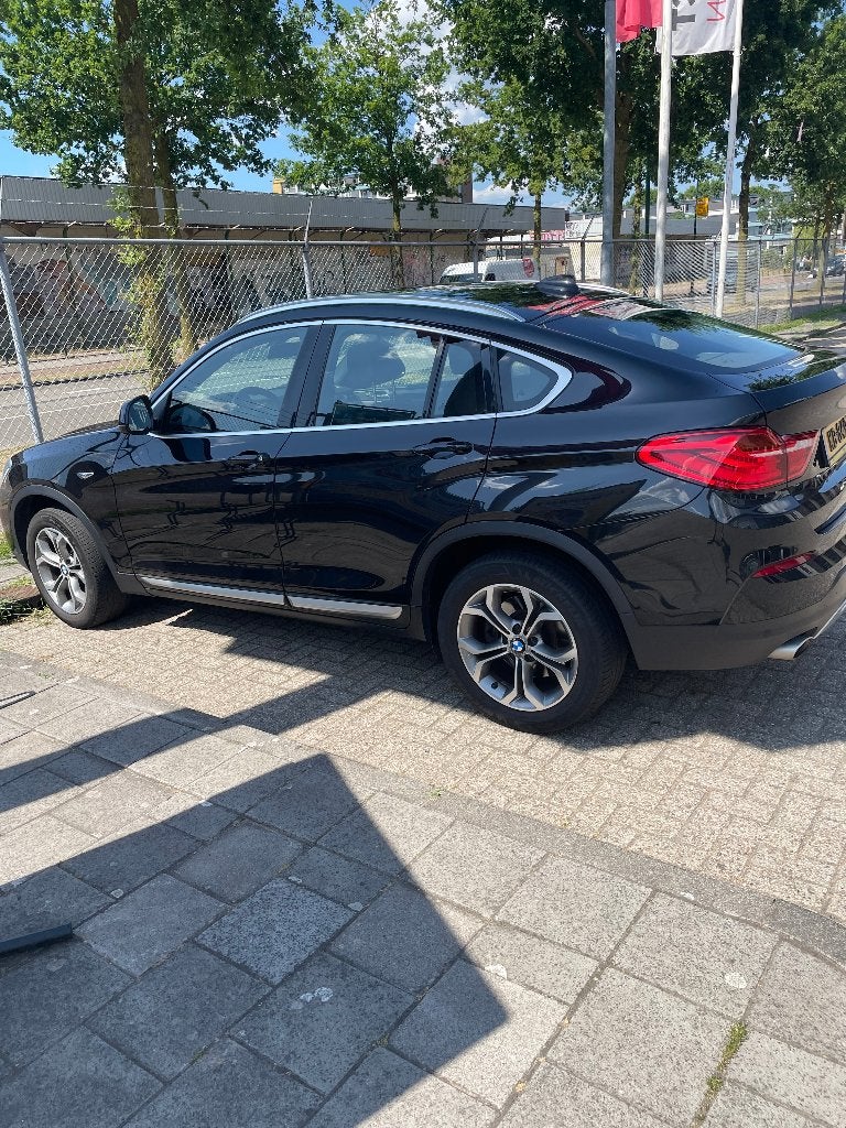 BMW X4 Xdrive 20D  2016 Zwart, Auto's, Automaat, 1995 cc, Euro 6, Bruin