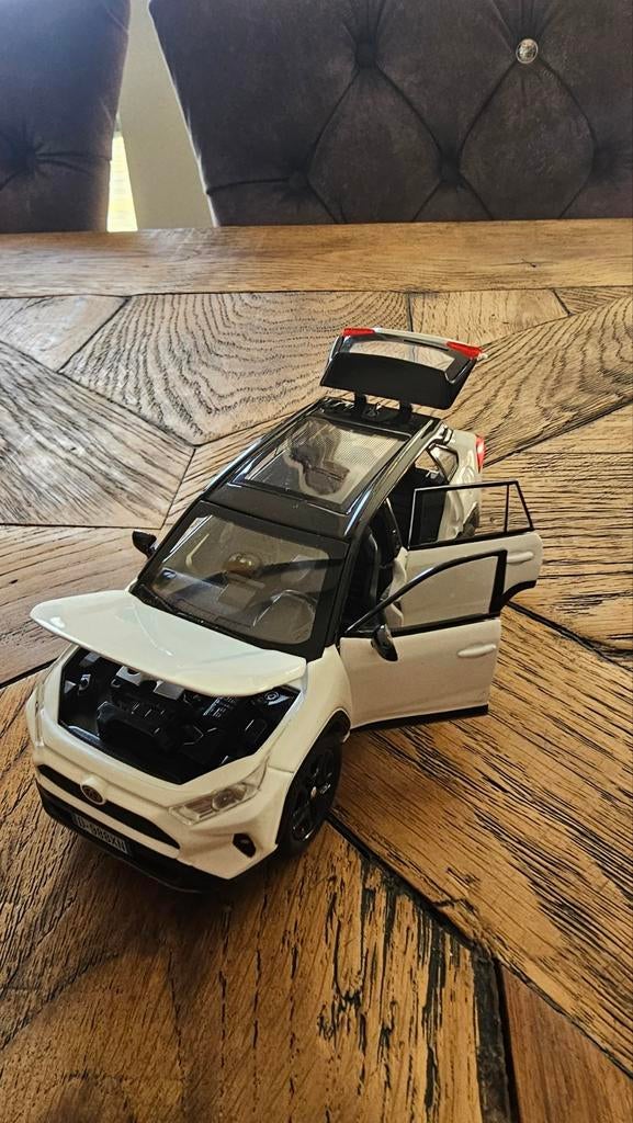 Toyota RAV4 Hybride parelmoer wit bitone Modelauto 1:32, Ophalen of Verzenden, Nieuw, Auto, Overige merken
