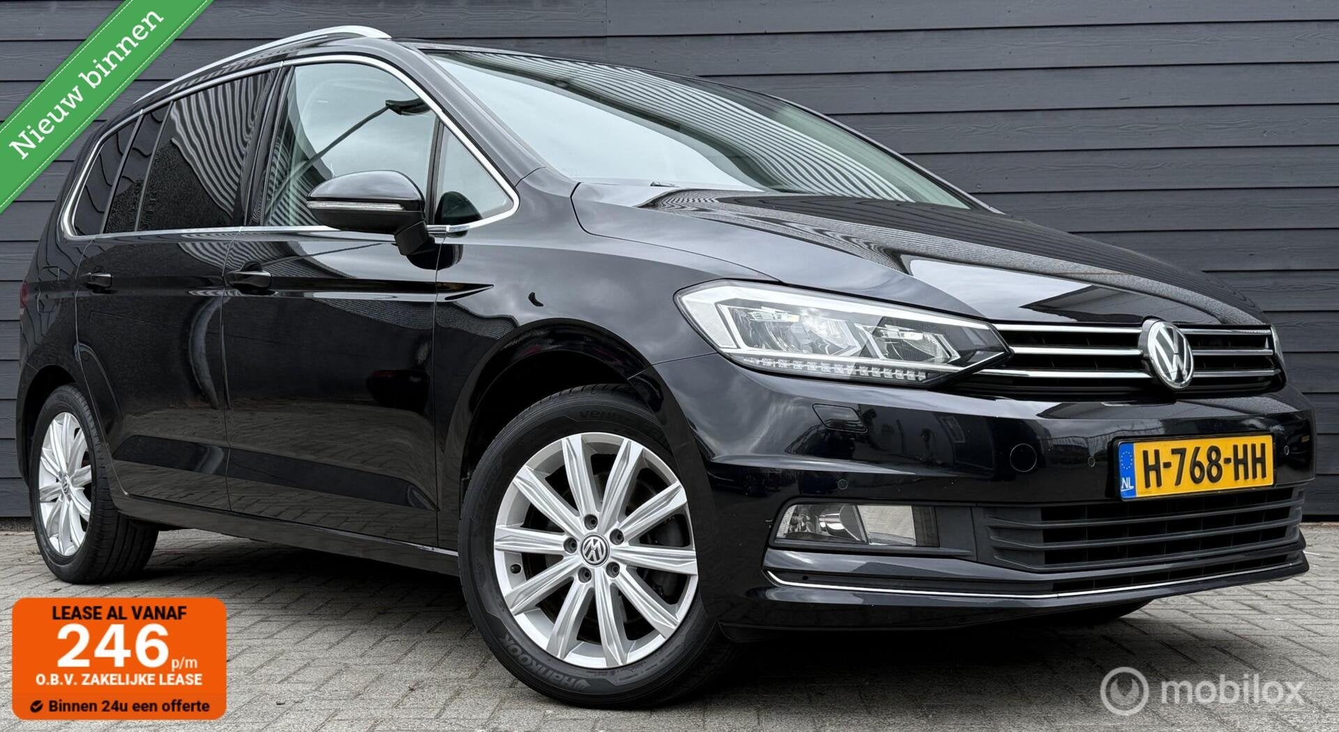 Volkswagen Touran 1.4 TSI DSG Highline Pano.dak/Trekhaak/Cam, Auto's, Volkswagen, Gebruikt, Euro 6, 4 cilinders, Zwart