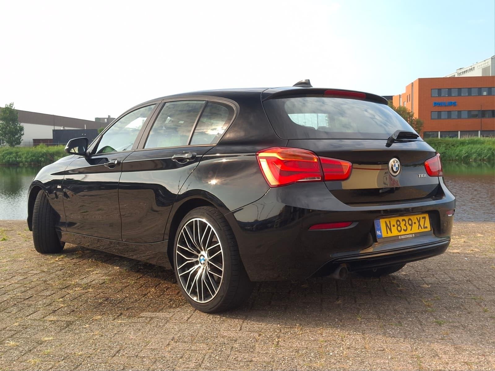 BMW 1-serie 118i High Executive Sport | AUT | STOELVERW. | T, Gebruikt, Automatische klimaatregeling, Zwart, Leder