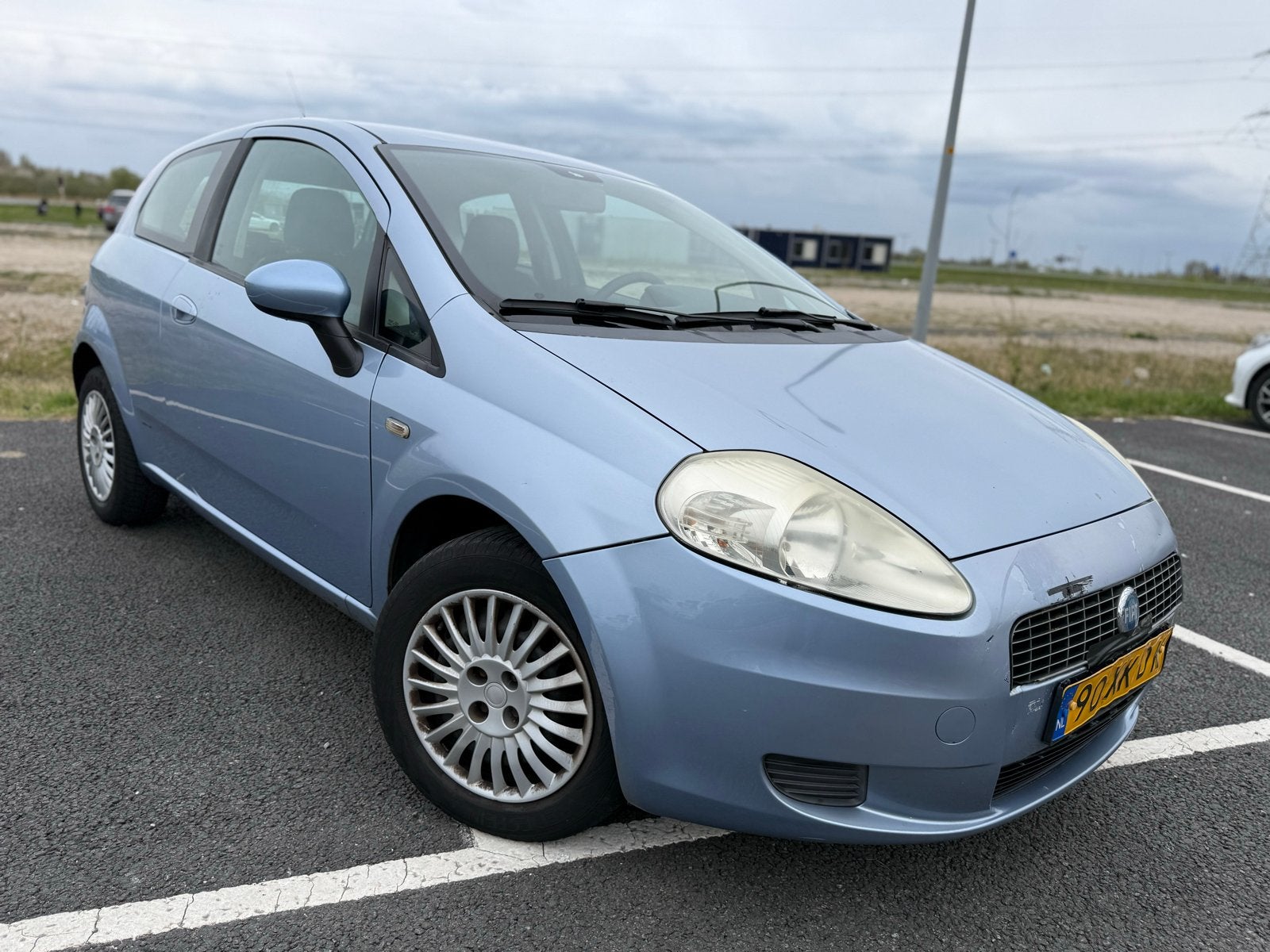 Fiat Punto 1.4 AUTOMAAT/AIRCO/CRUISE/NAP, Auto's, Stof, 40 €/maand, 4 cilinders, Origineel Nederlands