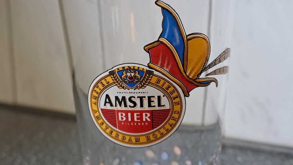 Vintage Amstel bier Carnaval glas '99 - uniek verzamelobject, Ophalen of Verzenden, Zo goed als nieuw, Glas of Glazen, Amstel