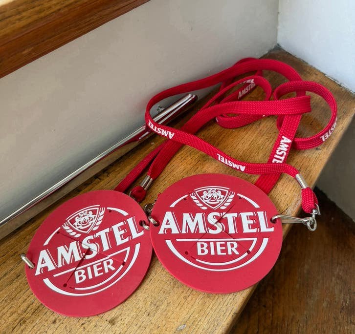 2x Amstel bier bekerhouder ketting, Ophalen of Verzenden, Zo goed als nieuw, Overige typen, Amstel
