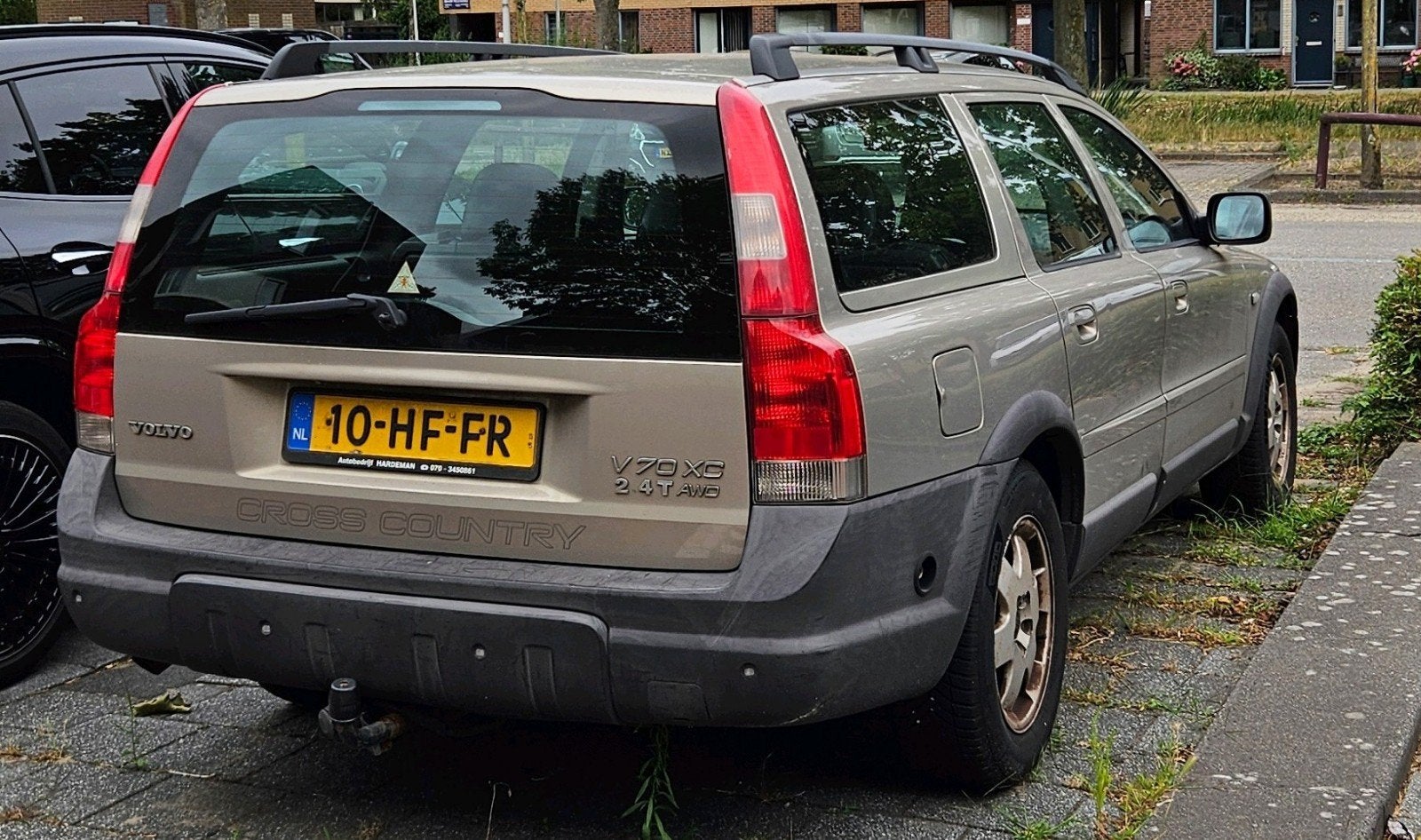 Volvo V70 2.4 T XC 4WD AUT 2001 Grijs, Auto's, Automaat, 1800 kg, Zwart, 1712 kg