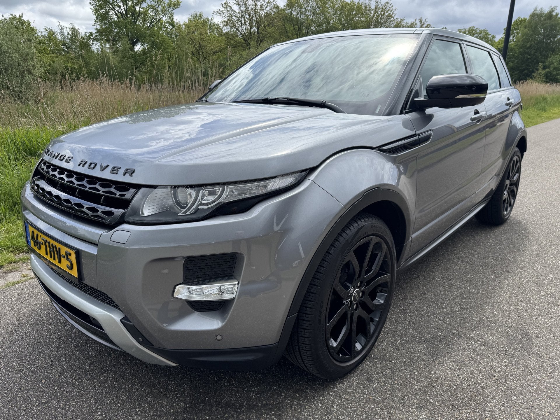 Land Rover Range Rover Evoque 2.0 Si 4WD Prestige Automaat, Auto's, Automaat, Euro 5, Zwart, 4 cilinders