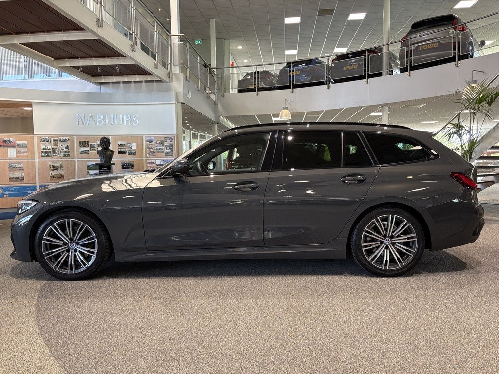 BMW 3 Serie Touring 320i High Executive M sport, Dravitgrau,, Automaat, Gebruikt, Euro 6, 4 cilinders