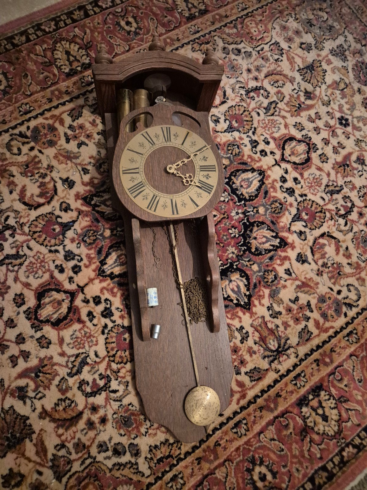 Antieke houten hangklok met slinger en gewichten, Ophalen