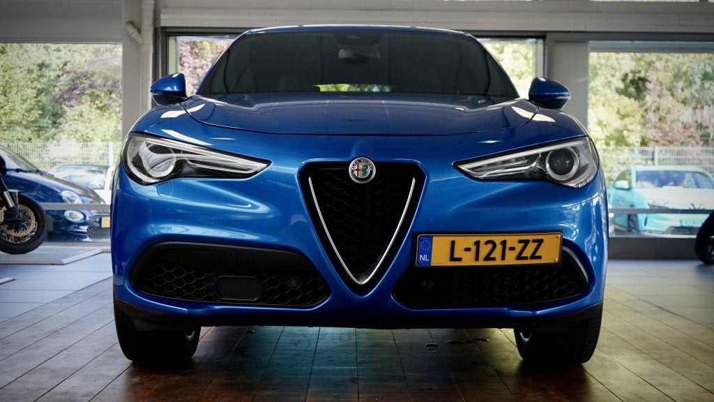 Alfa romeo Stelvio 2.0 T AWD B-Tech | Veloce stoelen | Trekh, Auto's, Automaat, 4 cilinders, Blauw, Bi-Xenon koplampen
