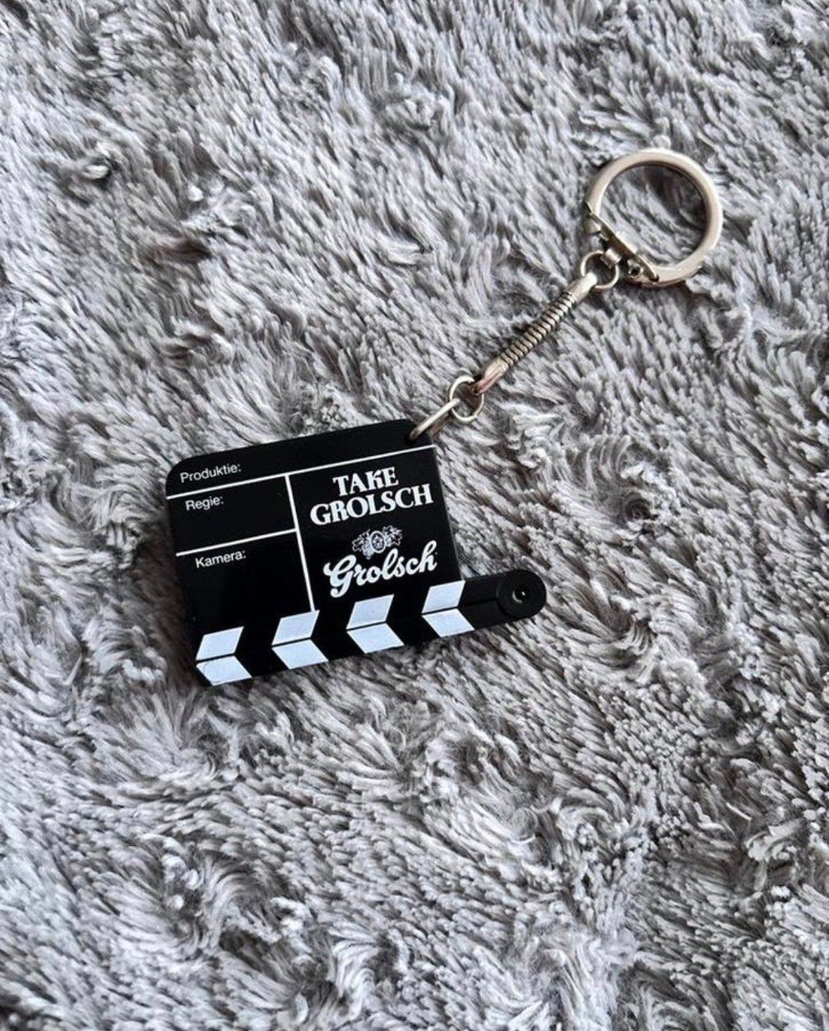 Grolsch Sleutelhanger Klapbord Film Take, Ophalen of Verzenden, Zo goed als nieuw, Merk