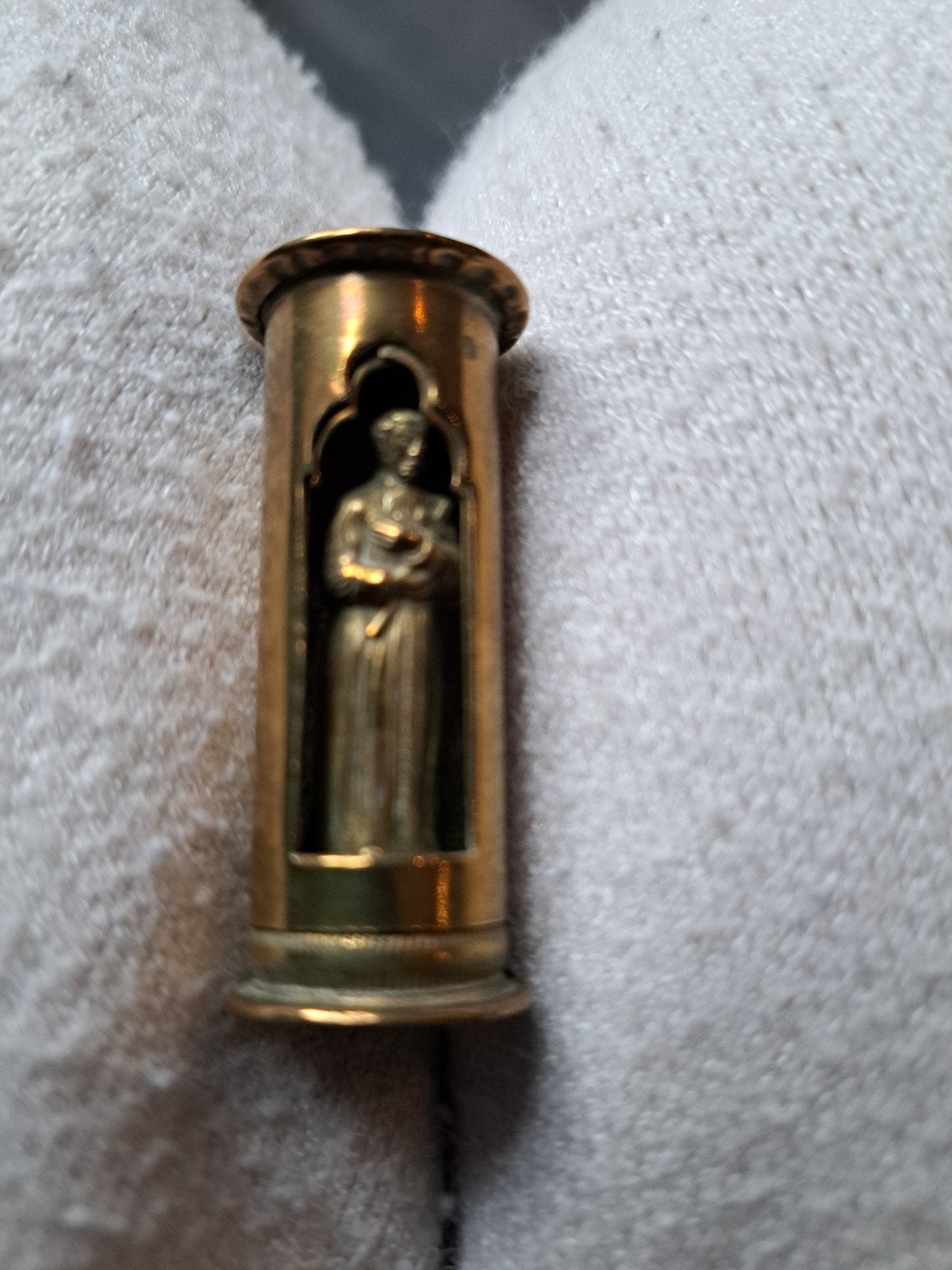 Antieke kogelhuls met religieus figuur, Antiek en Kunst, Ophalen of Verzenden