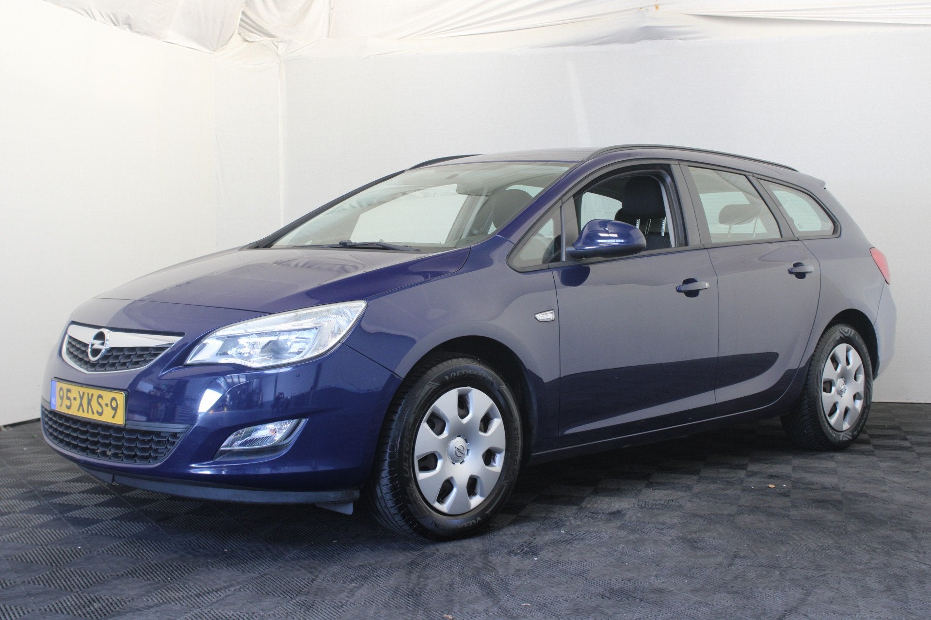 Opel Astra Sports Tourer 1.4 Turbo Edition (bj 2012), Auto's, Voorwielaandrijving, Euro 5, Stof, Gebruikt