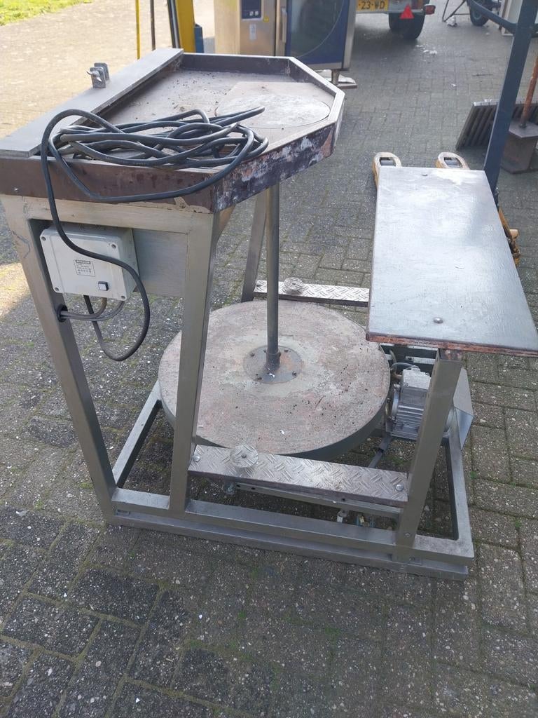 Draaischijf voor pottenbakken, Ophalen